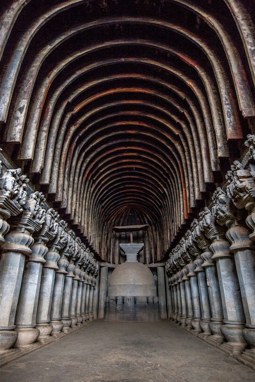 The Great Chaitya Hall interior at Karla Caves showing the vaulted roof and pillars